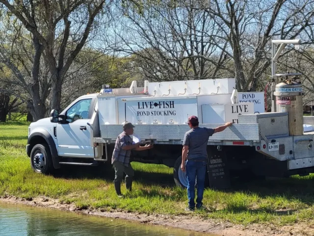 Fish delivery truck at a client pond