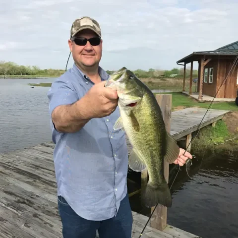 Man holding largemouth bass