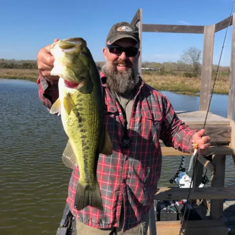 Man holding largemouth bass